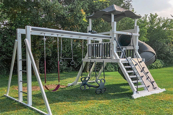 30 ft custom playset with slide, swings, see saw, rings, and ladder