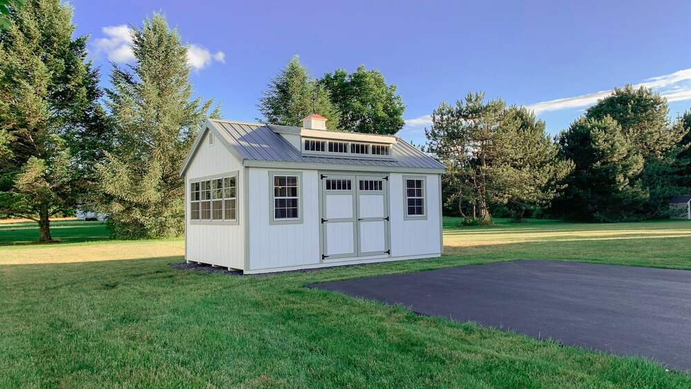 Breezy Acres sheds beige shed in grass