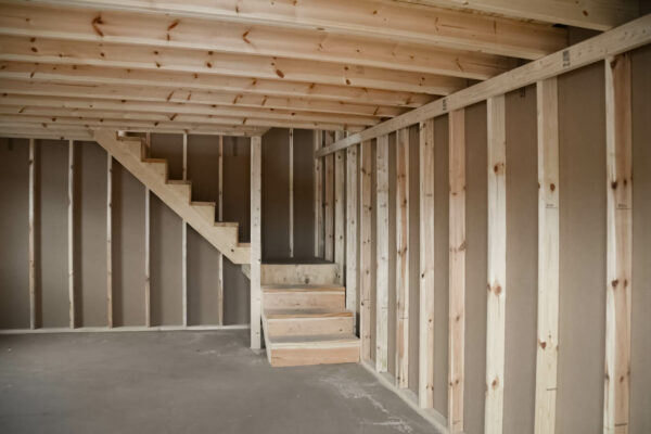 The Downstairs of the two story garage, showing the stairs that are built in.