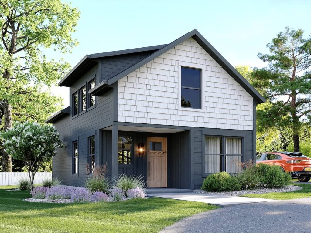 outside view a two story tiny home gray siding